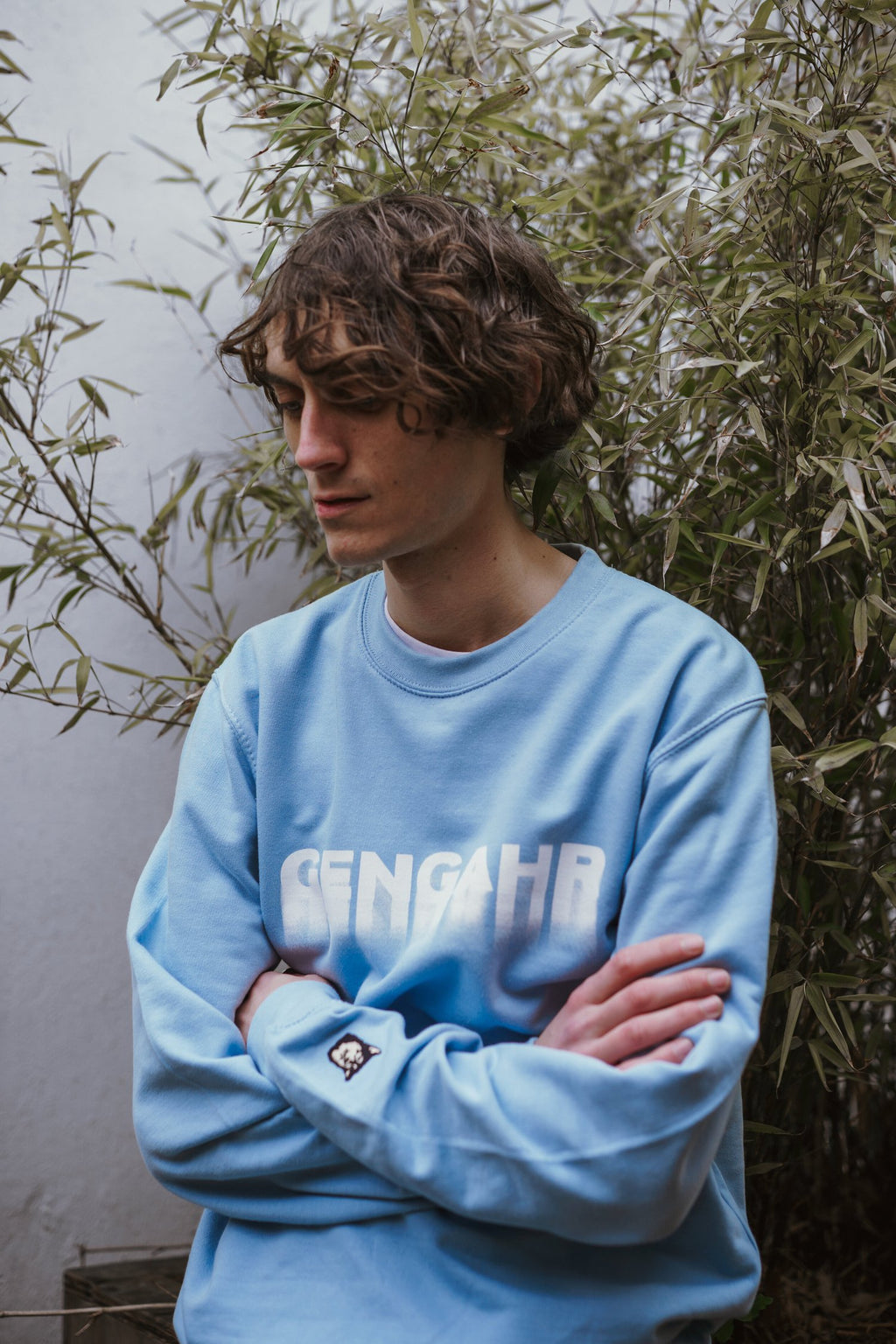 Gengahr baby blue logo sweatshirt worn by Hugh, screen printed logo on chest